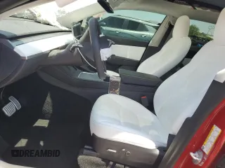 2022 Tesla Model Y Performance z VIN 7SAYGDEF9NF510183, wystawiony jako Copart lot #61263405 z przebiegiem 19 411 mil mil oraz Szkoda całkowita • Salvage title. Historia ofert i sprzedaży dostępna na DreamBid. Obrazek 7.