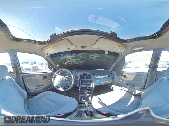 2001 Suzuki Esteem GL z VIN JS2GB41S915202412, wystawiony jako Copart lot #88372235 z przebiegiem 301 061 mil mil oraz Szkoda całkowita • Salvage title. Historia ofert i sprzedaży dostępna na DreamBid. Obrazek 12.