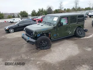 2024 Jeep Wrangler Willys z VIN 1C4RJXN64RW163089, wystawiony jako IAAI lot #41145274 z przebiegiem 31 869 mil mil oraz . Historia ofert i sprzedaży dostępna na DreamBid. Obrazek 2.