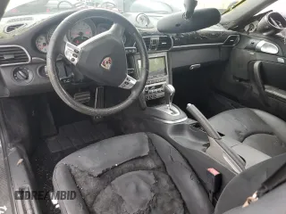 2008 Porsche 911 z VIN WP0CD29958S708310, wystawiony jako Copart lot #57027855 z przebiegiem 13 226 mil mil oraz Nie do naprawy • Non repairable. Historia ofert i sprzedaży dostępna na DreamBid. Obrazek 8.