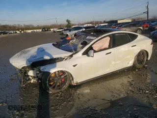 2016 Tesla Model S 90D с VIN 5YJSA1E29GF128397, выставлен на аукционе Copart как лот 86532184 с пробегом Не указан миль и Списание • Salvage title. История ставок и продаж доступна на DreamBid. Изображение 1.