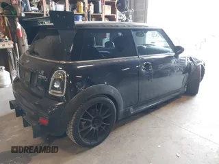 2008 MINI Hardtop S with VIN WMWMF73568TT87273, listed as a IAAI auction lot 41996859 with 107,671 mi miles and . Bid and sale history available at DreamBid. Image 4.