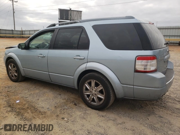 2009 Ford Taurus X Limited with VIN 1FMDK03W89GA01358, listed as a Copart auction lot 79132254 with 173,623 mi miles and Salvage title. Bid and sale history available at DreamBid. Image 2.