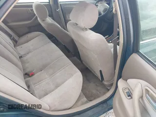 1997 Toyota Camry LE z VIN 4T1BG22K7VU005271, wystawiony jako IAAI lot #42098097 z przebiegiem Nie podano mil oraz . Historia ofert i sprzedaży dostępna na DreamBid. Obrazek 8.