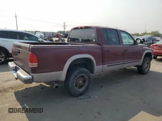 2000 Dodge Dakota Sport with VIN 1B7GG2AN1YS699073, listed as a Copart auction lot 70782284 with 141,876 mi miles and Salvage Title. Bid and sale history available at carsss.com. Image 3.