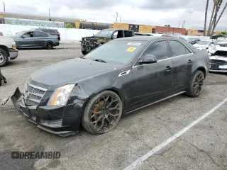 2011 Cadillac CTS with VIN 1G6DA5EY7B0132575, listed as a Copart auction lot 72469184 with 124,370 mi miles and Salvage Title. Bid and sale history available at DreamBid. Image 1.