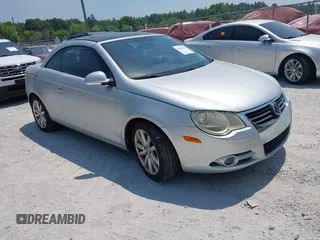 2008 Volkswagen Eos Turbo z VIN WVWBA71F58V030188, wystawiony jako IAAI lot #42040441 z przebiegiem 150 976 mil mil oraz . Historia ofert i sprzedaży dostępna na DreamBid. Obrazek 1.