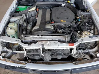 1991 Mercedes-Benz 300 CE с VIN WDBEA51D3MB285660, выставлен на аукционе Copart как лот 49656285 с пробегом 93 772 миль миль и Списание • Salvage title. История ставок и продаж доступна на DreamBid. Изображение 11.