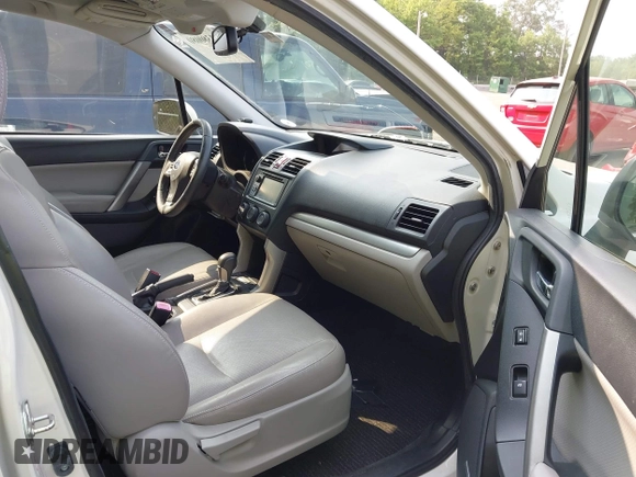 2015 Subaru Forester Touring with VIN JF2SJAWC9FH573973, listed as a IAAI auction lot 42380080 with 87,938 mi miles and . Bid and sale history available at DreamBid. Image 5.