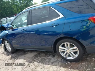2019 Chevrolet Equinox LT z VIN 3GNAXUEV4KL149570, wystawiony jako IAAI lot #42250214 z przebiegiem 79 743 mil mil oraz . Historia ofert i sprzedaży dostępna na DreamBid. Obrazek 14.