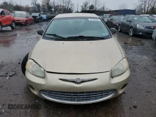 2001 Chrysler Sebring with VIN 1C3EL46U21N529263, listed as a Copart auction lot 82156584 with 57,895 mi miles and Clean Title. Bid and sale history available at DreamBid. Image 5.