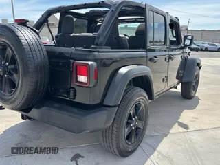 2023 Jeep Wrangler Sport S with VIN 1C4HJXDG2PW615754, listed as a Copart auction lot 53884255 with 34,427 mi miles and Clean Title. Bid and sale history available at DreamBid. Image 4.