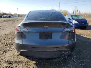 2023 Tesla Model Y Long Range z VIN 7SAYGDEE0PA206005, wystawiony jako Copart lot #50681145 z przebiegiem 31 989 mil mil oraz Szkoda całkowita • Salvage title. Historia ofert i sprzedaży dostępna na DreamBid. Obrazek 6.