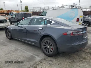 2016 Tesla Model S 90D with VIN 5YJSA1E44GF152673, listed as a Copart auction lot 50995495 with 69,439 mi miles and Salvage Title. Bid and sale history available at DreamBid. Image 2.