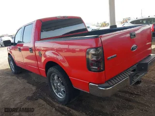 2004 Ford F-150 XLT with VIN 1FTRW12W74FA15854, listed as a IAAI auction lot 41917424 with 325,330 mi miles. Bid and sale history available at carsss.com. Image 3.