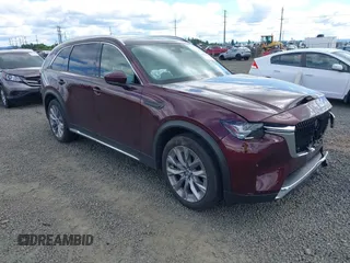 2024 Mazda CX-90 Premium z VIN JM3KKDHD0R1108232, wystawiony jako IAAI lot #42224398 z przebiegiem 3 934 mil mil oraz . Historia ofert i sprzedaży dostępna na DreamBid. Obrazek 1.