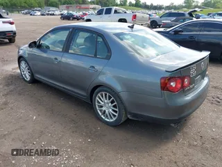 2008 Volkswagen Jetta Sedan Wolfsburg with VIN 3VWRJ71K58M185147, listed as a IAAI auction lot 42076387 with 193,621 mi miles. Bid and sale history available at carsss.com. Image 3.