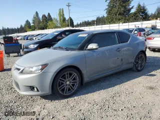 2011 Scion tC with VIN JTKJF5C76B3000765, listed as a Copart auction lot 53954445 with 243,554 mi miles and Salvage Title. Bid and sale history available at carsss.com. Image 1.