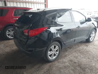 2010 Hyundai Tucson GLS with VIN KM8JU3AC0AU070395, listed as a IAAI auction lot 41933773 with 18,097 mi miles and . Bid and sale history available at DreamBid. Image 4.