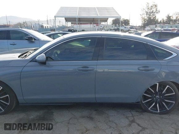 2023 Honda Accord Touring with VIN 1HGCY2F81PA035053, listed as a IAAI auction lot 41807628 with 57,422 mi miles and . Bid and sale history available at DreamBid. Image 14.