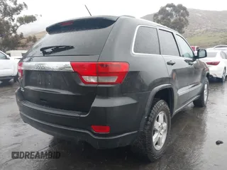 2011 Jeep Grand Cherokee Laredo z VIN 1J4RR4GG1BC566381, wystawiony jako IAAI lot #41547199 z przebiegiem 215 157 mil mil oraz . Historia ofert i sprzedaży dostępna na DreamBid. Obrazek 4.