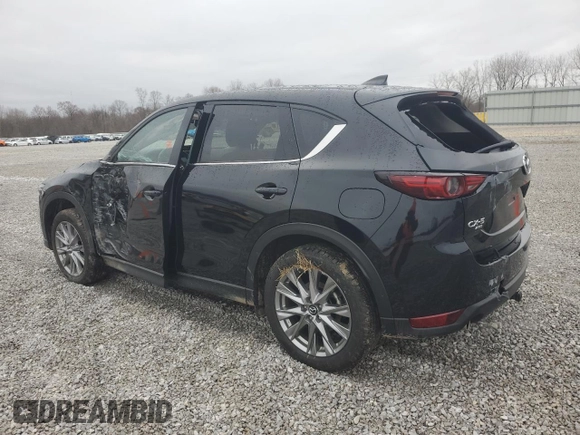 2021 Mazda CX-5 Grand Touring with VIN JM3KFBDM3M1423520, listed as a Copart auction lot 49423225 with 38,918 mi miles and Salvage Title. Bid and sale history available at carsss.com. Image 2.