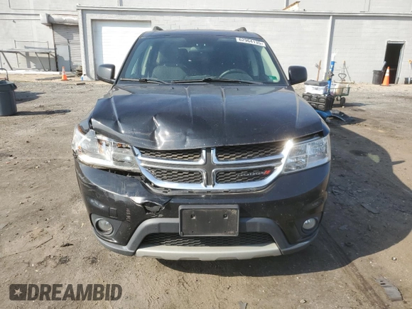 2013 Dodge Journey SXT with VIN 3C4PDCBG4DT619319, listed as a Copart auction lot 62964135 with 140,620 mi miles and Salvage title. Bid and sale history available at DreamBid. Image 5.