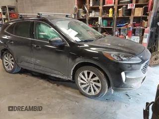 2022 Ford Escape Titanium Hybrid z VIN 1FMCU9DZ3NUA11150, wystawiony jako IAAI lot #41300138 z przebiegiem 60 210 mil mil oraz . Historia ofert i sprzedaży dostępna na DreamBid. Obrazek 1.