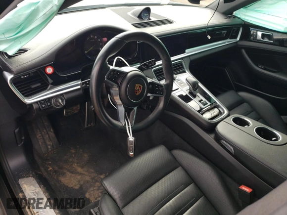 2018 Porsche Panamera 4 E-Hybrid z VIN WP0AE2A72JL127720, wystawiony jako Copart lot #71872404 z przebiegiem Nie podano mil oraz Szkoda całkowita • Salvage title. Historia ofert i sprzedaży dostępna na DreamBid. Obrazek 8.