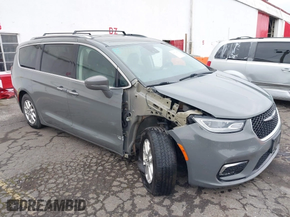 2021 Chrysler Pacifica Touring L with VIN 2C4RC1BG0MR543634, listed as a IAAI auction lot 41513467 with 148,010 mi miles and . Bid and sale history available at DreamBid. Image 6.
