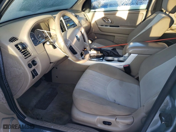 2007 Mercury Mariner Luxury with VIN 4M2CU91147KJ00348, listed as a Copart auction lot 89218185 with 184,182 mi miles and Salvage Title. Bid and sale history available at carsss.com. Image 7.
