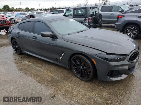 2022 BMW 8 Series 840i with VIN WBAGV2C09NCH61770, listed as a Copart auction lot 48985785 with 21,354 mi miles and Salvage Title. Bid and sale history available at DreamBid. Image 4.