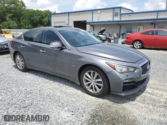 2014 Infiniti Q50 Sport with VIN JN1BV7AR4EM702521, listed as a Copart auction lot 61017205 with 61,317 mi miles and Salvage title. Bid and sale history available at DreamBid. Image 4.