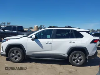 2023 Toyota RAV4 Hybrid XLE with VIN 4T3RWRFV2PU085104, listed as a IAAI auction lot 41825077 with 110,877 mi miles. Bid and sale history available at carsss.com. Image 14.