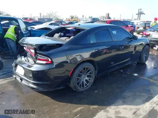 2017 Dodge Charger SE with VIN 2C3CDXBG8HH515103, listed as a IAAI auction lot 41599588 with 128,805 mi miles. Bid and sale history available at carsss.com. Image 4.