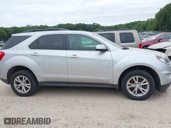 2016 Chevrolet Equinox LT z VIN 2GNALCEK9G1168510, wystawiony jako IAAI lot #42445901 z przebiegiem 165 031 mil mil oraz . Historia ofert i sprzedaży dostępna na DreamBid. Obrazek 13.
