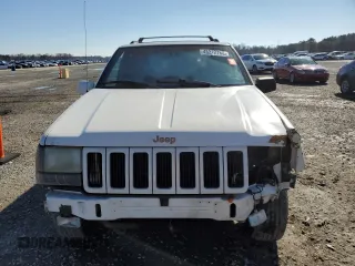 1998 Jeep Grand Cherokee Limited with VIN 1J4GZ78Y0WC307578, listed as a Copart auction lot 45272765 with 328,264 mi miles and Salvage title. Bid and sale history available at DreamBid. Image 5.