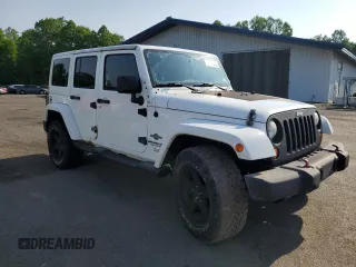 2013 Jeep Wrangler Unlimited Sport z VIN 1C4HJWDG9DL581643, wystawiony jako Copart lot #60775805 z przebiegiem 148 959 mil mil oraz Czysty tytuł • Clean title. Historia ofert i sprzedaży dostępna na DreamBid. Obrazek 4.