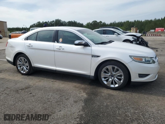 2010 Ford Taurus Limited with VIN 1FAHP2FW4AG144445, listed as a Copart auction lot 56878295 with 148,439 mi miles and Salvage title. Bid and sale history available at DreamBid. Image 4.