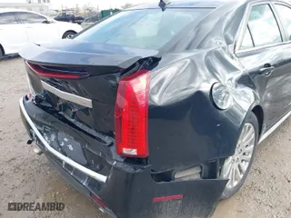 2011 Cadillac CTS Sedan Performance with VIN 1G6DL5ED6B0151304, listed as a IAAI auction lot 41720093 with 197,861 mi miles. Bid and sale history available at carsss.com. Image 19.