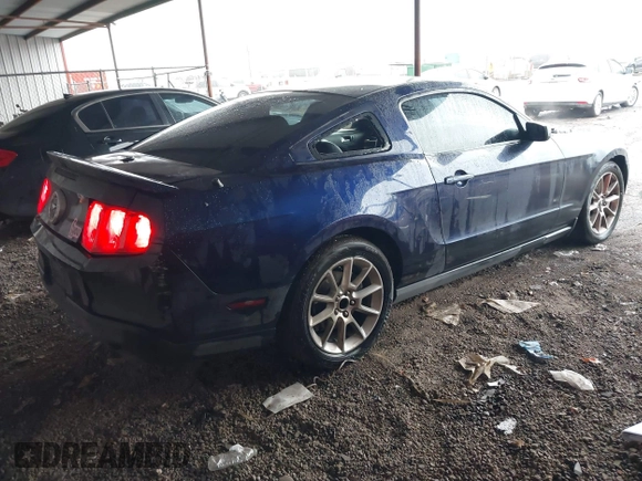 2011 Ford Mustang V6 with VIN 1ZVBP8AM9B5153645, listed as a IAAI auction lot 41304583 with 123,204 mi miles and . Bid and sale history available at carsss.com. Image 4.