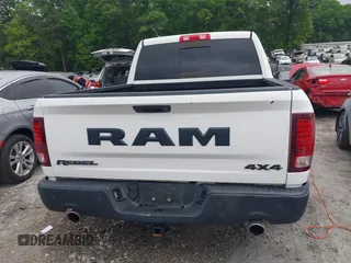 2017 Ram 1500 Rebel with VIN 1C6RR7YT7HS575529, listed as a IAAI auction lot 42125529 with 110,722 mi miles and . Bid and sale history available at DreamBid. Image 16.