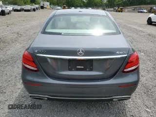 2018 Mercedes-Benz E 300 with VIN WDDZF4KBXJA337966, listed as a Copart auction lot 58718355 with 54,264 mi miles and Salvage title. Bid and sale history available at DreamBid. Image 6.