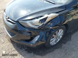 2014 Hyundai Elantra SE with VIN KMHDH4AE5EU101798, listed as a IAAI auction lot 41785753 with 206,799 mi miles. Bid and sale history available at carsss.com. Image 6.