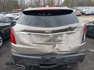 2023 Cadillac XT5 FWD Luxury z VIN 1GYKNAR45PZ140440, wystawiony jako IAAI lot #41723317 z przebiegiem 25 124 mil mil oraz . Historia ofert i sprzedaży dostępna na DreamBid. Obrazek 16.