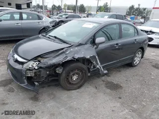 2009 Honda Civic Sdn LX with VIN 2HGFA16589H525012, listed as a IAAI auction lot 41878674 with 109,832 mi miles. Bid and sale history available at carsss.com. Image 2.