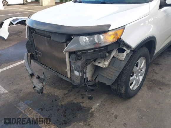 2012 Kia Sorento LX with VIN 5XYKT3A61CG235882, listed as a IAAI auction lot 41720081 with 136,282 mi miles. Bid and sale history available at carsss.com. Image 13.