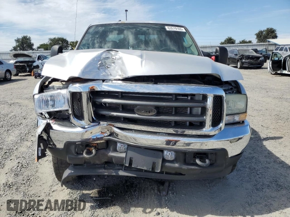 2004 Ford F-350 XL with VIN 1FTSW31P04EC44129, listed as a Copart auction lot 63519165 with 205,411 mi miles and Salvage title. Bid and sale history available at DreamBid. Image 5.