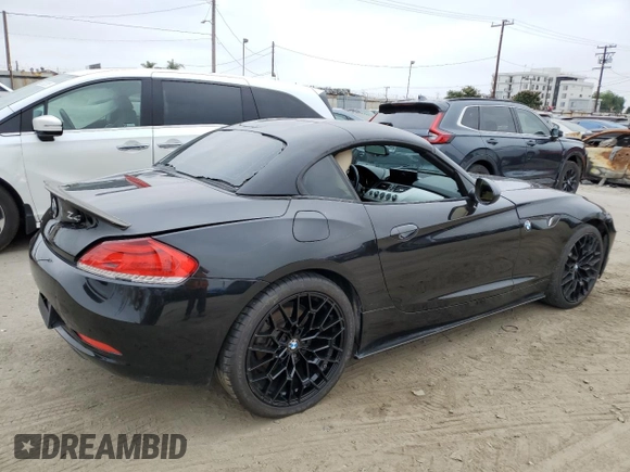 2012 BMW Z4 sDrive28i with VIN WBALL5C56CE716558, listed as a Copart auction lot 62003125 with 93,438 mi miles and Salvage title. Bid and sale history available at DreamBid. Image 3.