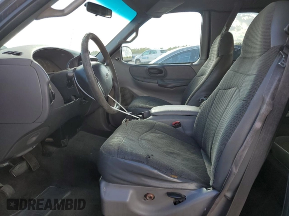 2000 Ford F-150 with VIN 1FTRX07W3YKA56561, listed as a Copart auction lot 81149654 with 185,967 mi miles and Salvage title. Bid and sale history available at DreamBid. Image 7.